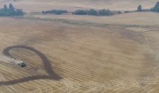 After Washington school shooting, farmer pays respect in field