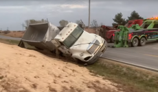 Greg Peterson avoids major collision but rolls grain truck into ditch